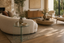 Ilaria Tempered Glass Round Side Table in a glass side tables interior, styled with clear glass, icy blue and matte black, showing premium furniture scale and luxury design context.