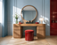 Agneta Solid Wood Dressing Table in a dressing tables interior, styled with powder blue, lacquer red and natural ash, showing premium furniture scale and luxury design context.