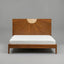 Wooden bed with a sunburst design headboard on a gray background