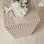Italian Ribbed travertine plinths