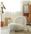 Plush cream bouclé accent chair with rounded organic shape