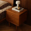 Warm wooden mid-century style nightstand