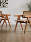 Front view of Nullah Rattan Dining Arm Chair showcasing solid wood frame and rattan seat