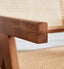 Front view of Nullah Rattan Dining Arm Chair showcasing solid wood frame and rattan seat