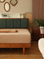 Green channel-tufted headboard with walnut wood frame