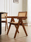 Front view of Nullah Rattan Dining Arm Chair showcasing solid wood frame and rattan seat