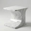 Marble-patterned side table on a gray background