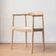 Light ash wood chair with curved back and woven rattan seat