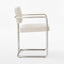Elegant dining chair with a durable stainless steel structure.