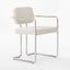 Contemporary chair with ergonomic upholstery and metallic frame.