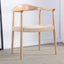 Light ash wood chair with curved back and woven rattan seat