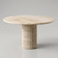 Round marble table with a textured cylindrical base on a gray background