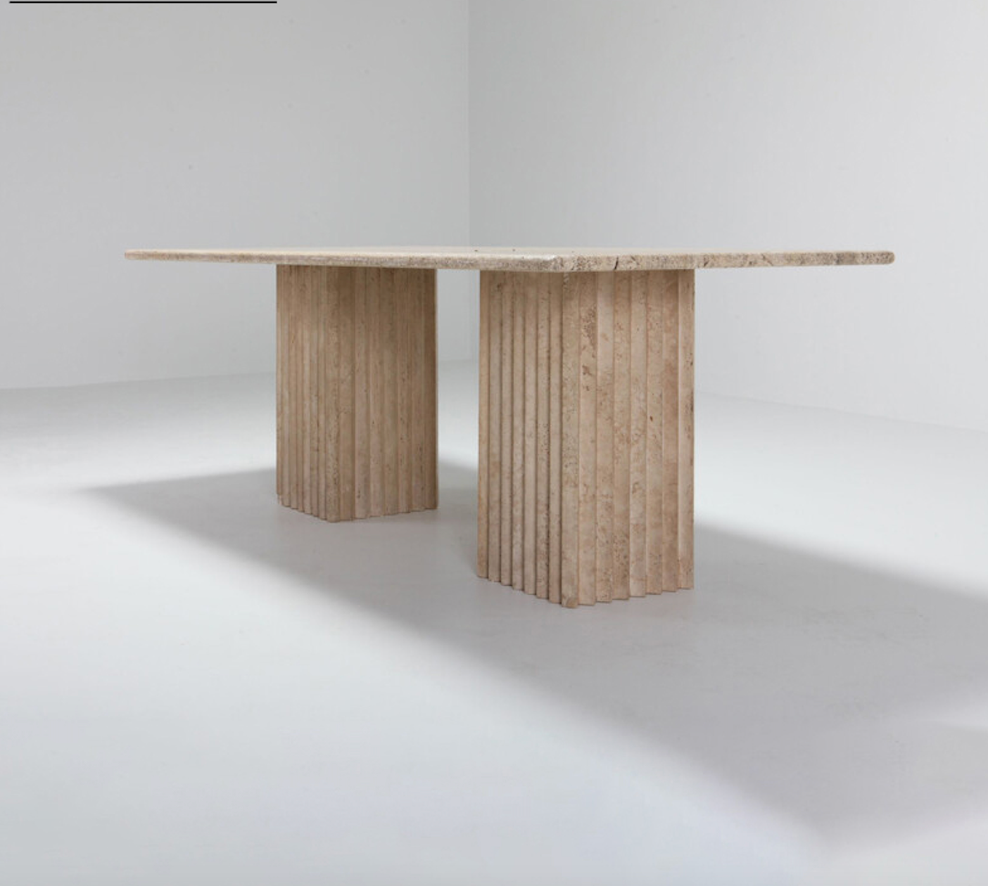 Carlotta Rectangle Travertine Dining Table from Dill & Johan, selected for Rectangle Dining Tables for Entertaining Getting Scale and Comfort Right, shown as product inspiration for premium furniture, material quality and luxury interior design context.