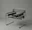 Modern chair with black leather seats and chrome frame on a gray background