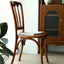 Elegant beech wood chair with a timeless, vintage-inspired design.