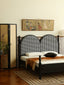 Black and white gingham headboard with double arches and dark wooden frame