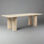 Monaco Travertine Dining Table – Elegant Turkish beige travertine with cylindrical legs.
