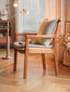 Stylish cherry wood chair perfect for dining or office spaces.