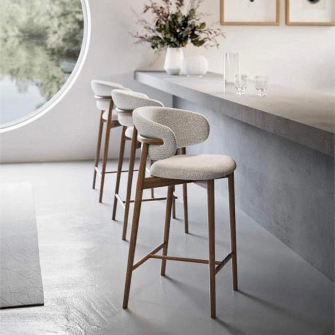 Elio Curved Backrest Linen Bar Stool from Dill & Johan, selected for Kitchen Island Seating Choosing Bar Stools That Feel Designed-In, shown as product inspiration for premium furniture, material quality and luxury interior design context.