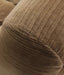 Plush low-profile lounger with tufted camel upholstery
