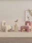 Pink teddy velvet accent chair with architectural design