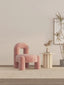 Pink teddy velvet accent chair with architectural design