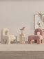 Pink teddy velvet accent chair with architectural design