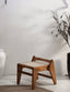 Small wooden stool with woven rattan seat