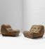 Plush low-profile lounger with tufted camel upholstery