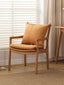  Modern wooden chair with a timeless, minimalist aesthetic.