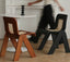 Gigi chair featuring stainless steel frame and natural agate rattan.