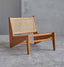 Midcentury wood chair with rattan backrest.