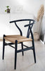 Black wishbone chair with natural woven seat